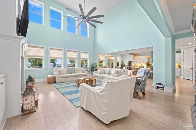 a metallic refrigerator freezer sitting in a kitchen