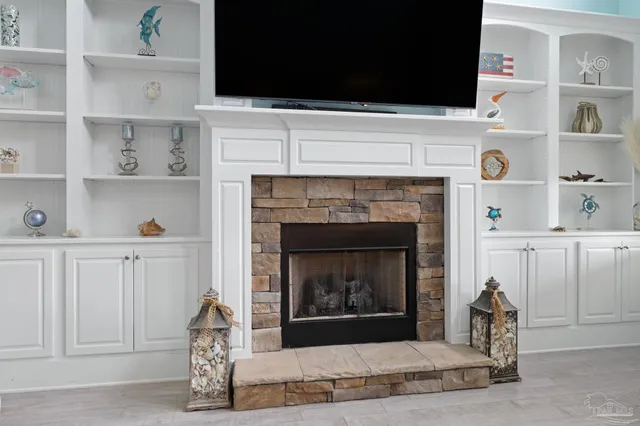 a bed room with a bed and a flat screen tv