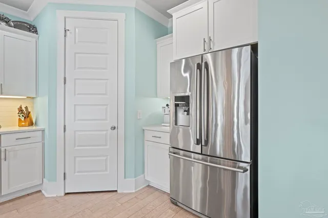 a white toilet sitting next to a shower curtain