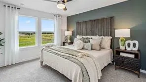 a bedroom with a bed and a couch