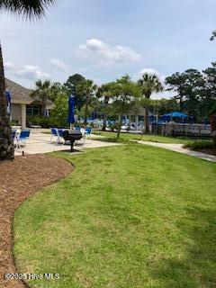 1012 Crosby Circle Southwest Sunset Beach, NC 28468 - Photo 7 of 7 Ocean Ridge - Pool area with clubhouse a