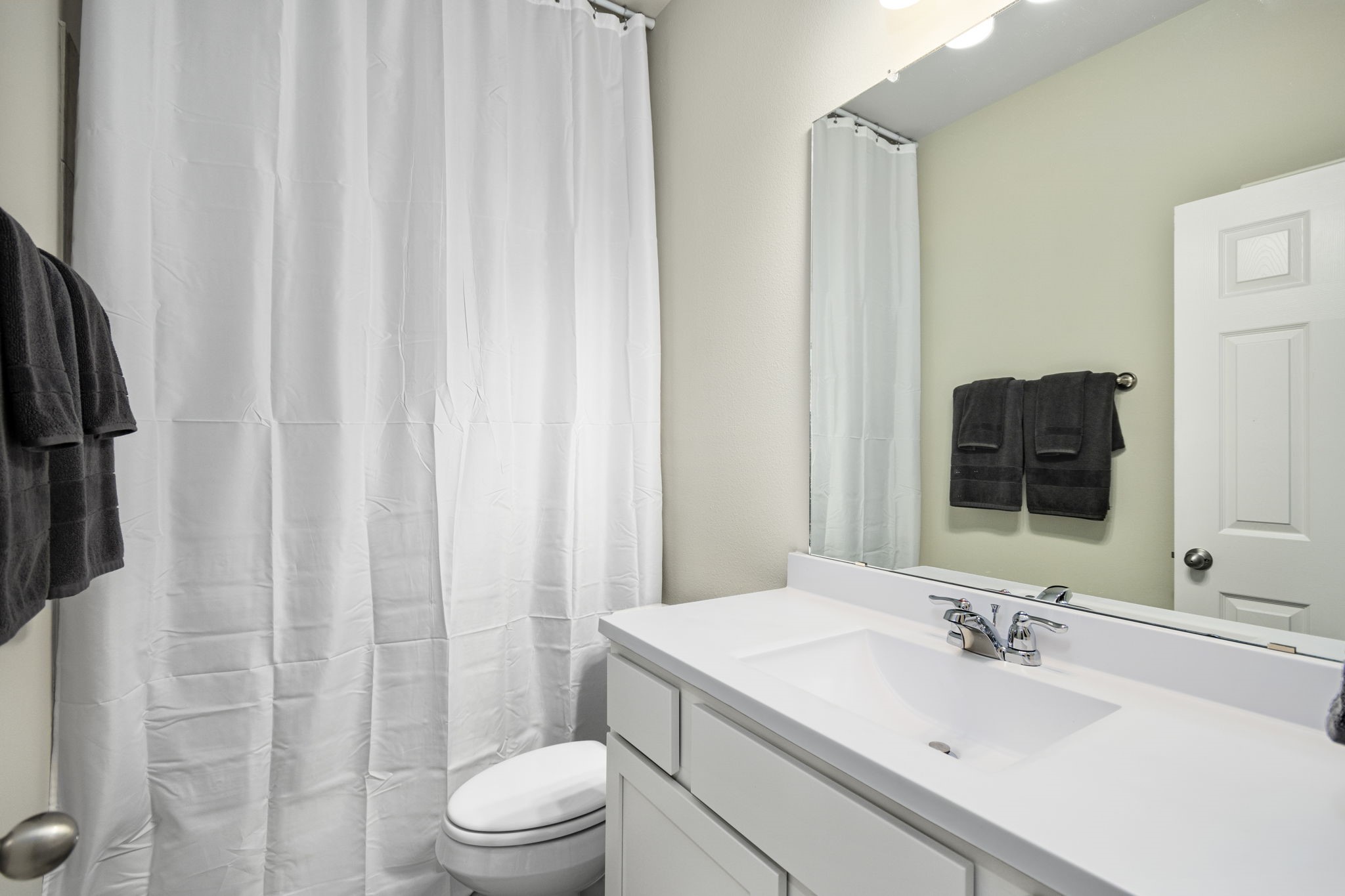 26019 Babe Ruth Drive Splendora, TX 77372 - Photo 13 of 23 a bathroom with a sink toilet and shower