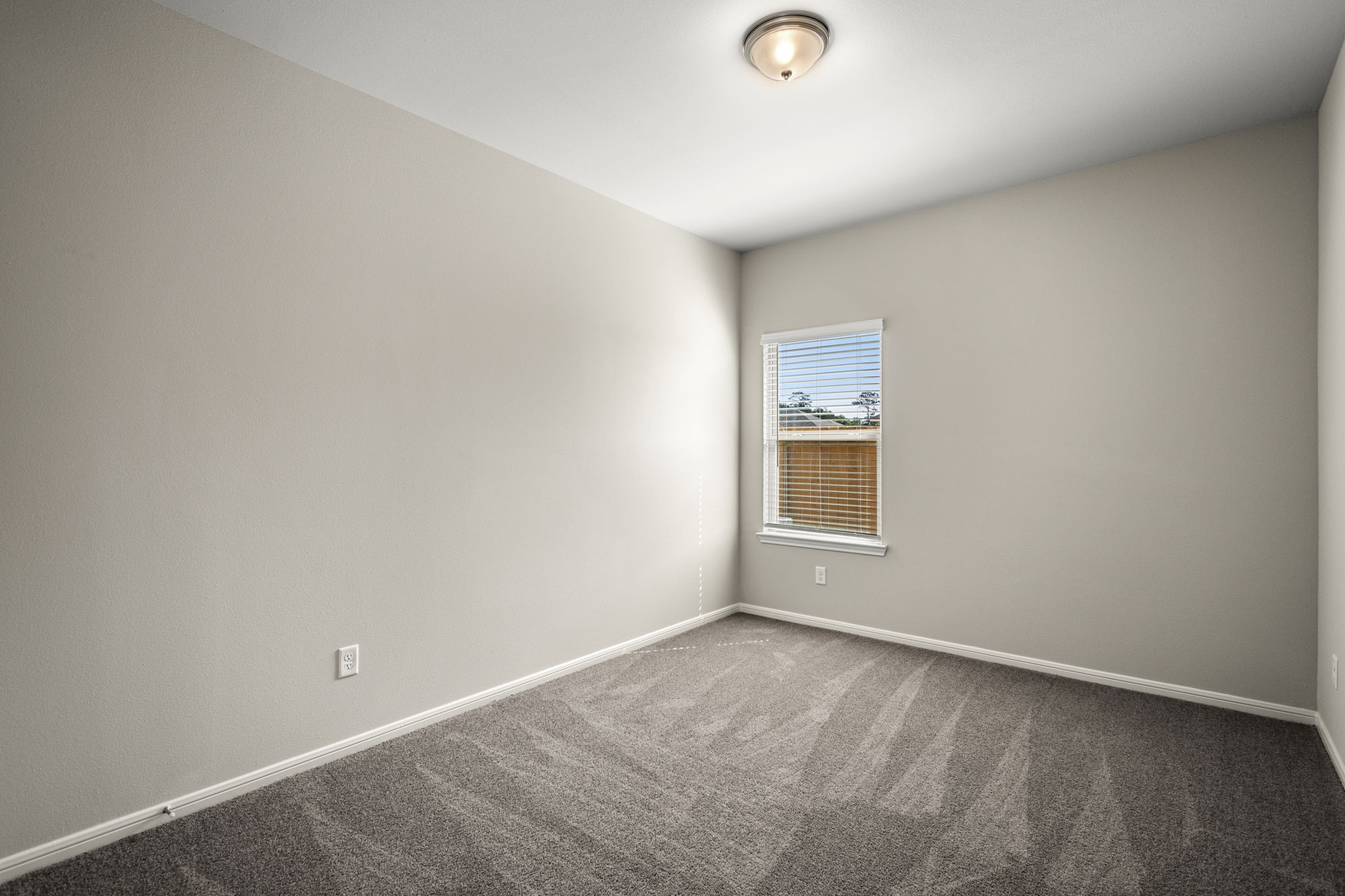 26019 Babe Ruth Drive Splendora, TX 77372 - Photo 15 of 23 an empty room with a window