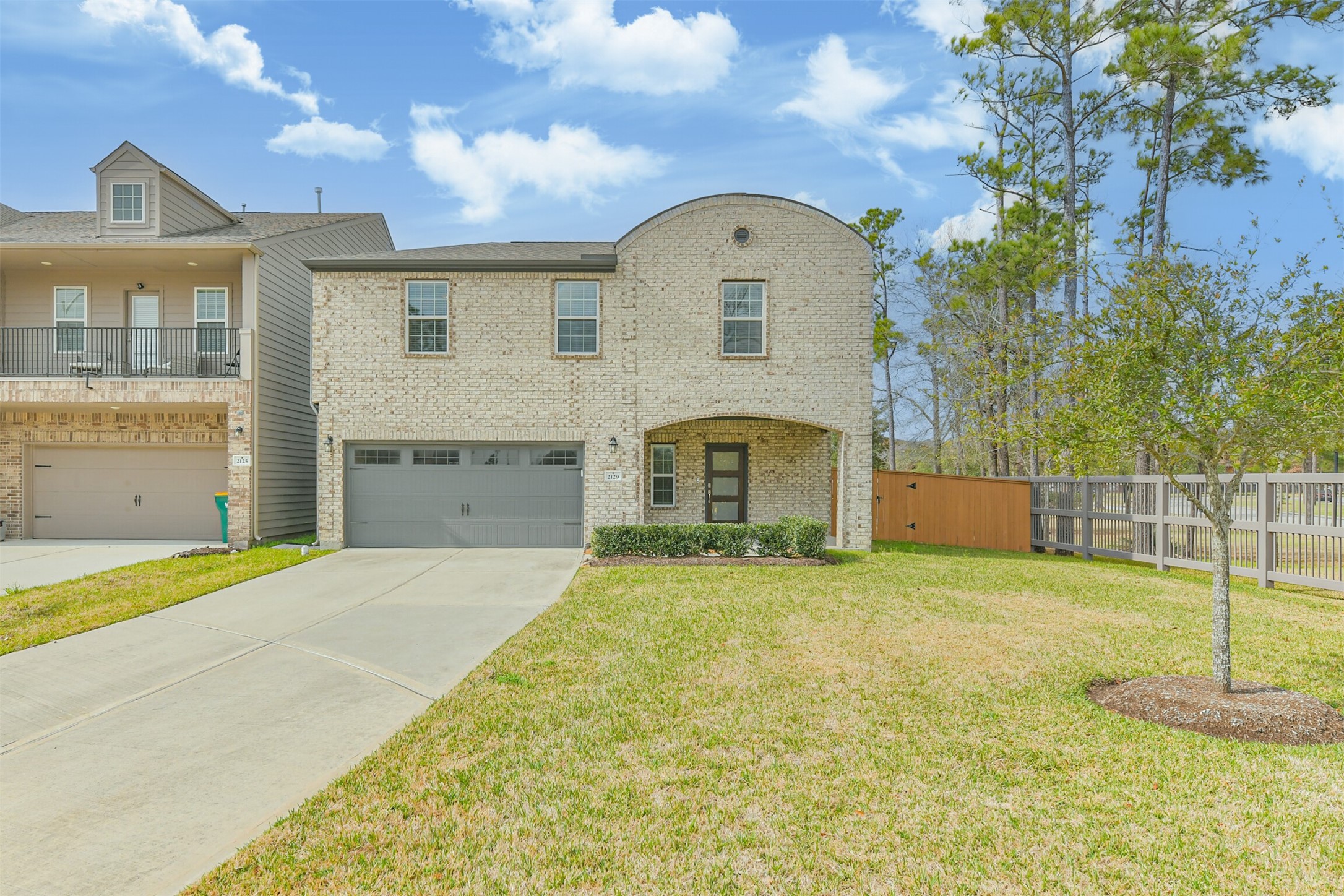 Beautiful 2021 brick elevation with a charming covered entry and great curb appeal. Spacious driveway, two-car garage, and a generously sized front yard maintained by the HOA. Located in a quiet gated section with no rear neighbors and easy access to community amenities.
