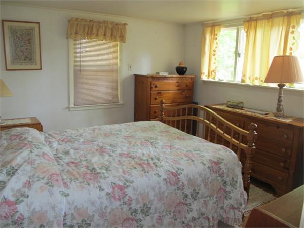 23 Patterson Road Lexington, MA 02421 - Photo 11 of 22 a bedroom with a bed and a window