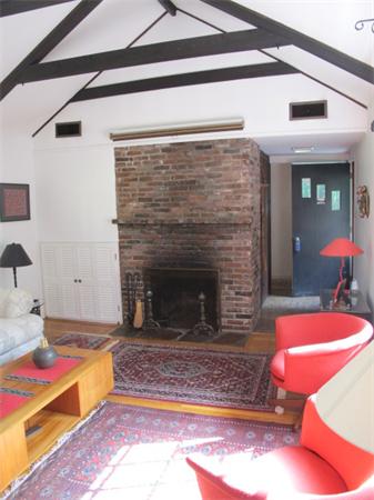 23 Patterson Road Lexington, MA 02421 - Photo 3 of 22 a living room with furniture and a fireplace