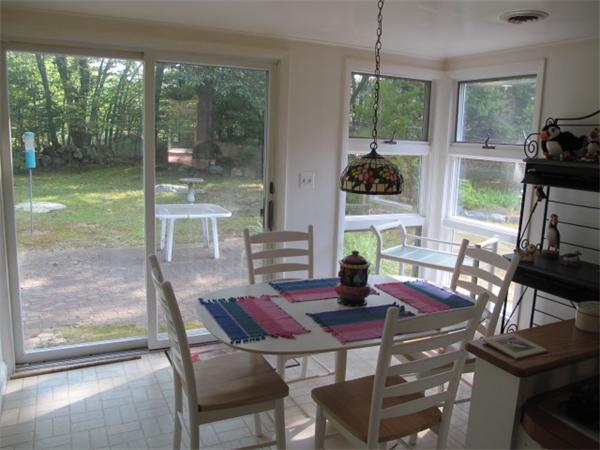 23 Patterson Road Lexington, MA 02421 - Photo 6 of 22 a view of a dining room with furniture window and outside view