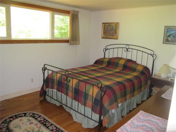 23 Patterson Road Lexington, MA 02421 - Photo 8 of 22 a bedroom with a bed and a window