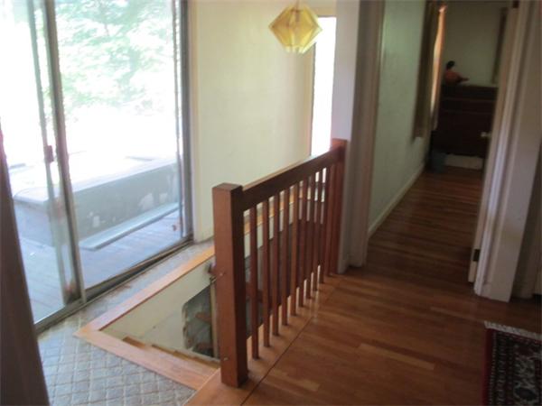 23 Patterson Road Lexington, MA 02421 - Photo 9 of 22 a view of a porch with wooden floor