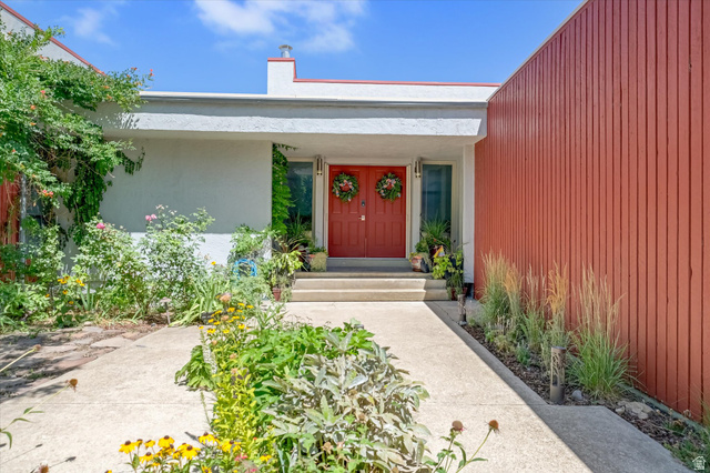 510 Spring Creek Road Providence, UT 84332 - Photo 2 of 97 Modernist facade featuring a prominent red double-door entry
