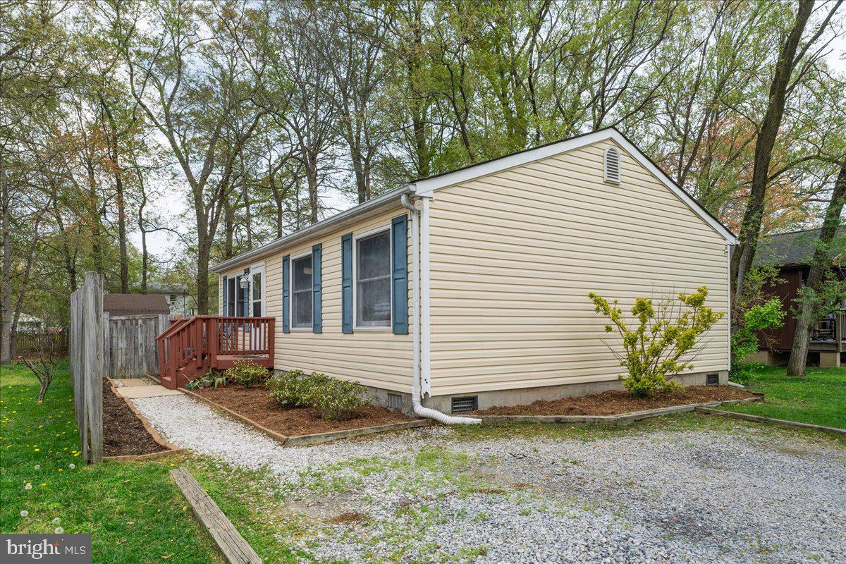 5519 Baskin Street Churchton, MD 20733 - Photo 1 of 20 a view of a house with a yard