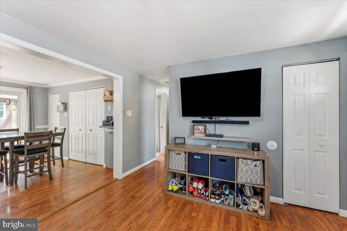 5519 Baskin Street Churchton, MD 20733 - Photo 4 of 20 a view of a livingroom with furniture and wooden floor
