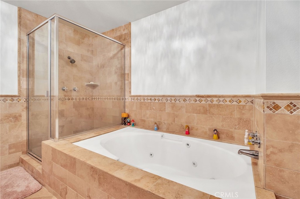 6516 Sandy Point Court Rancho Palos Verdes, CA 90275 - Photo 23 of 49 Primary bath with tub and shower