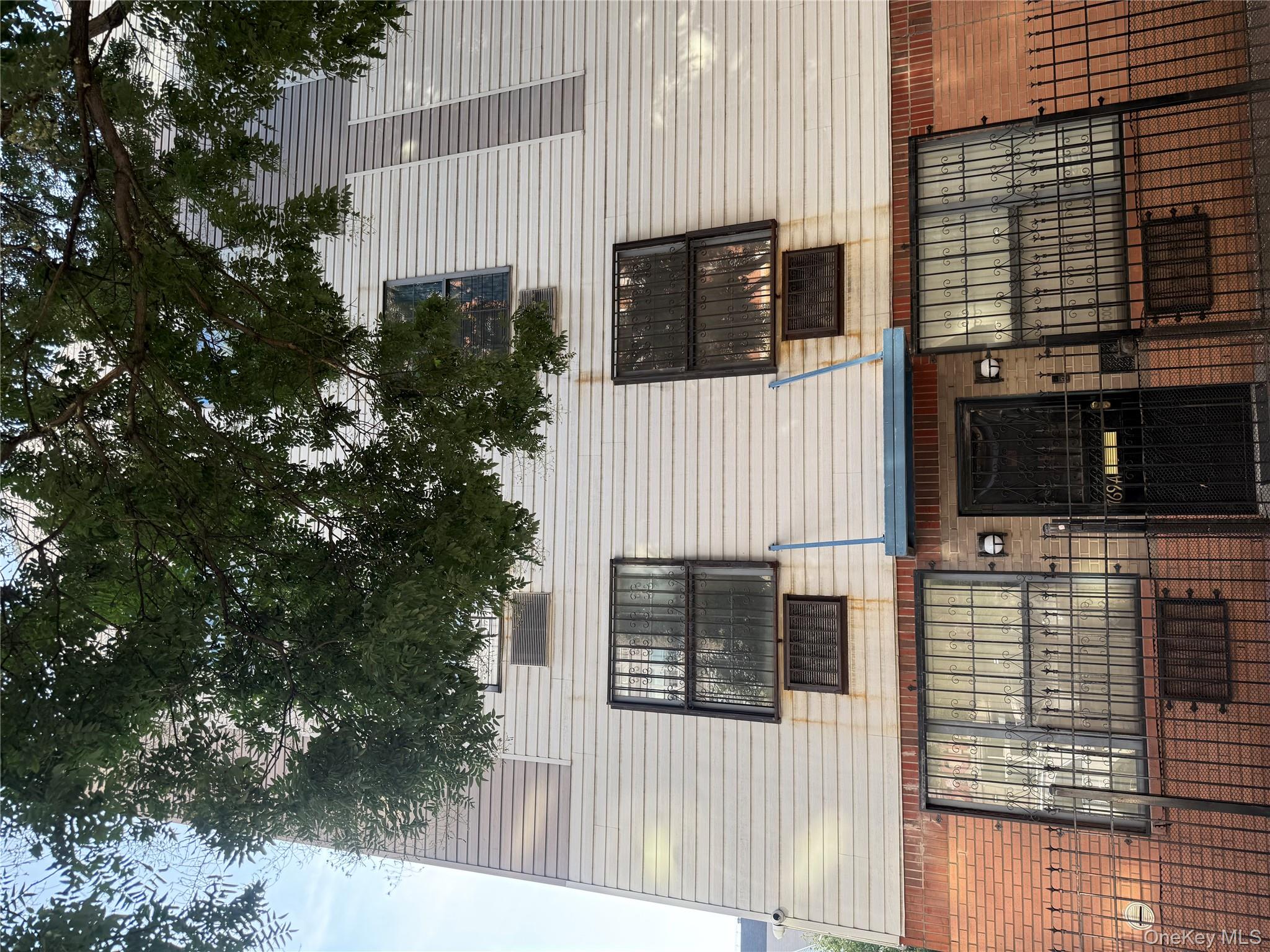 769 St Ann's Avenue, Unit B Bronx, NY 10456 - Photo 16 of 48 a view of a brick house with large windows