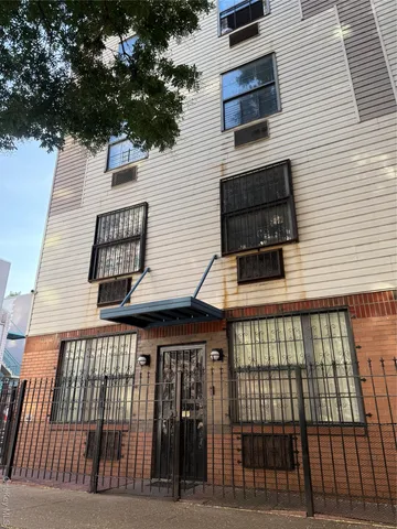 a view of a street with cars