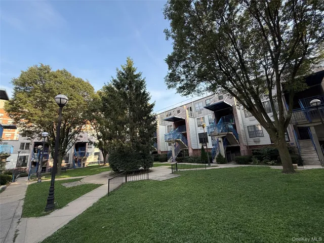 a bathroom with a sink a toilet and bathtub