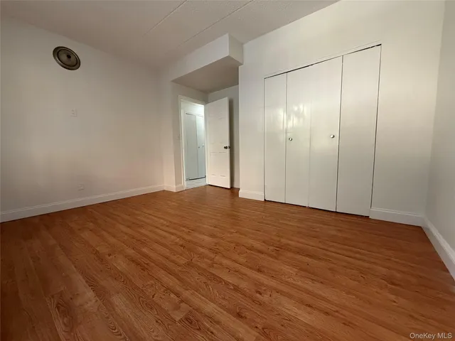 a kitchen with a stove a sink and a microwave