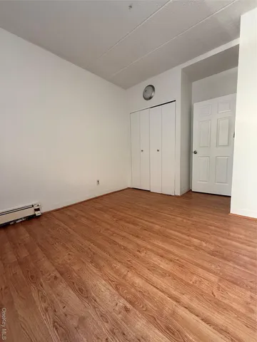 a view of balcony with furniture