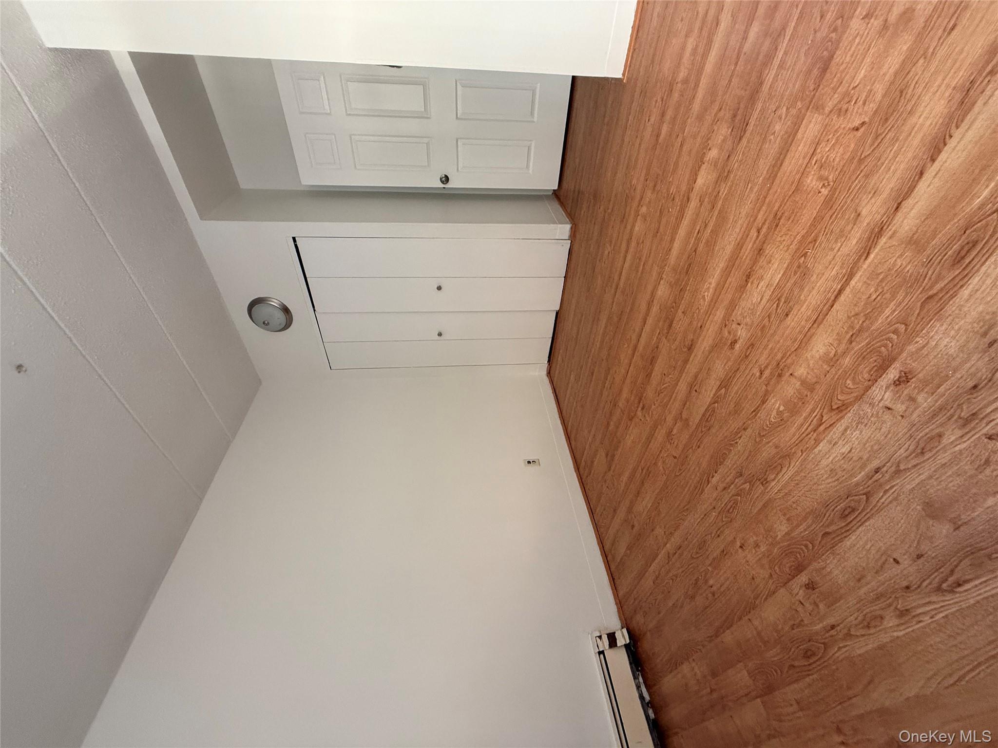 769 St Ann's Avenue, Unit B Bronx, NY 10456 - Photo 41 of 48 a view of an empty room and wooden floor