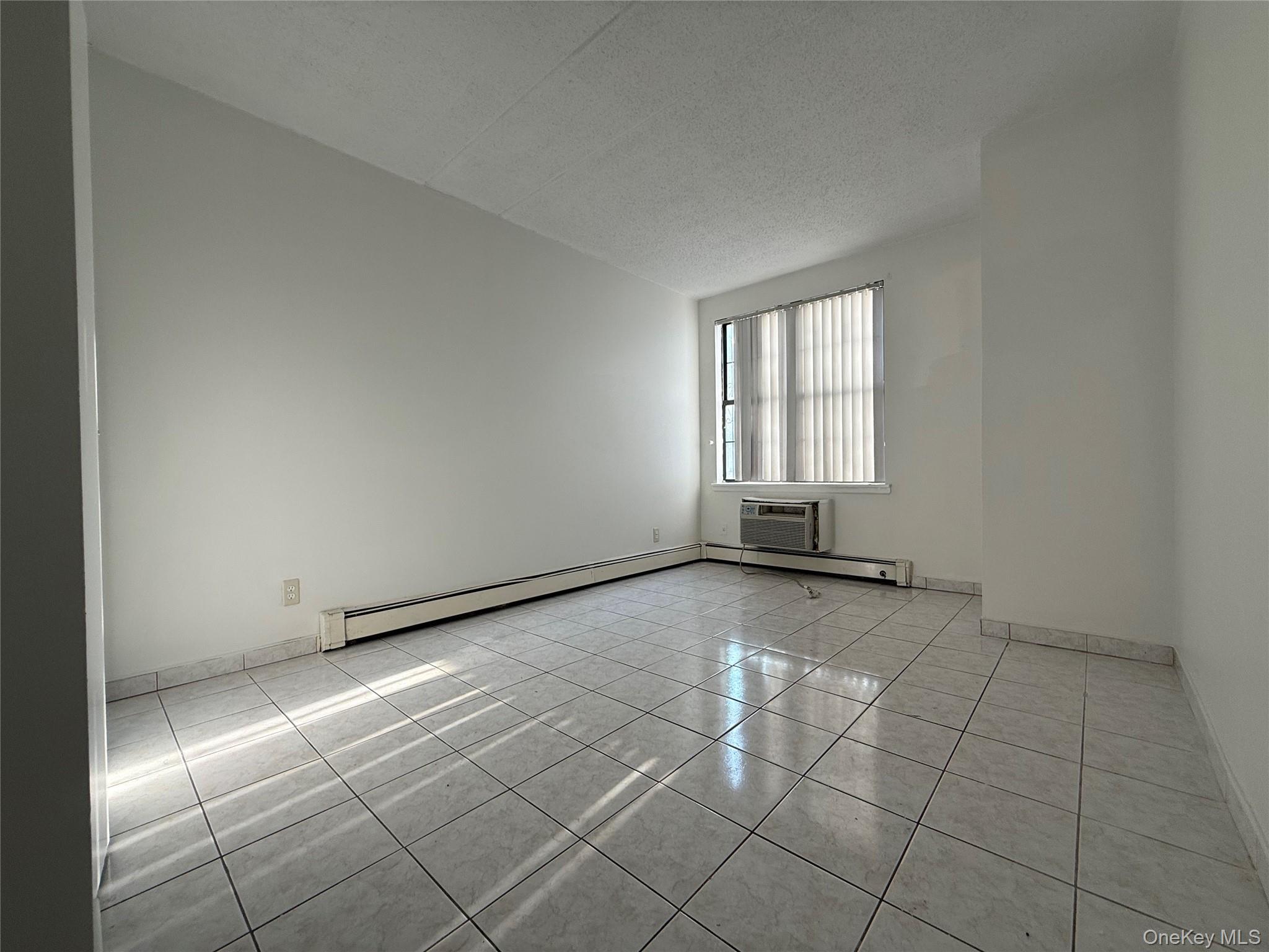 769 St Ann's Avenue, Unit B Bronx, NY 10456 - Photo 6 of 48 an empty room with windows