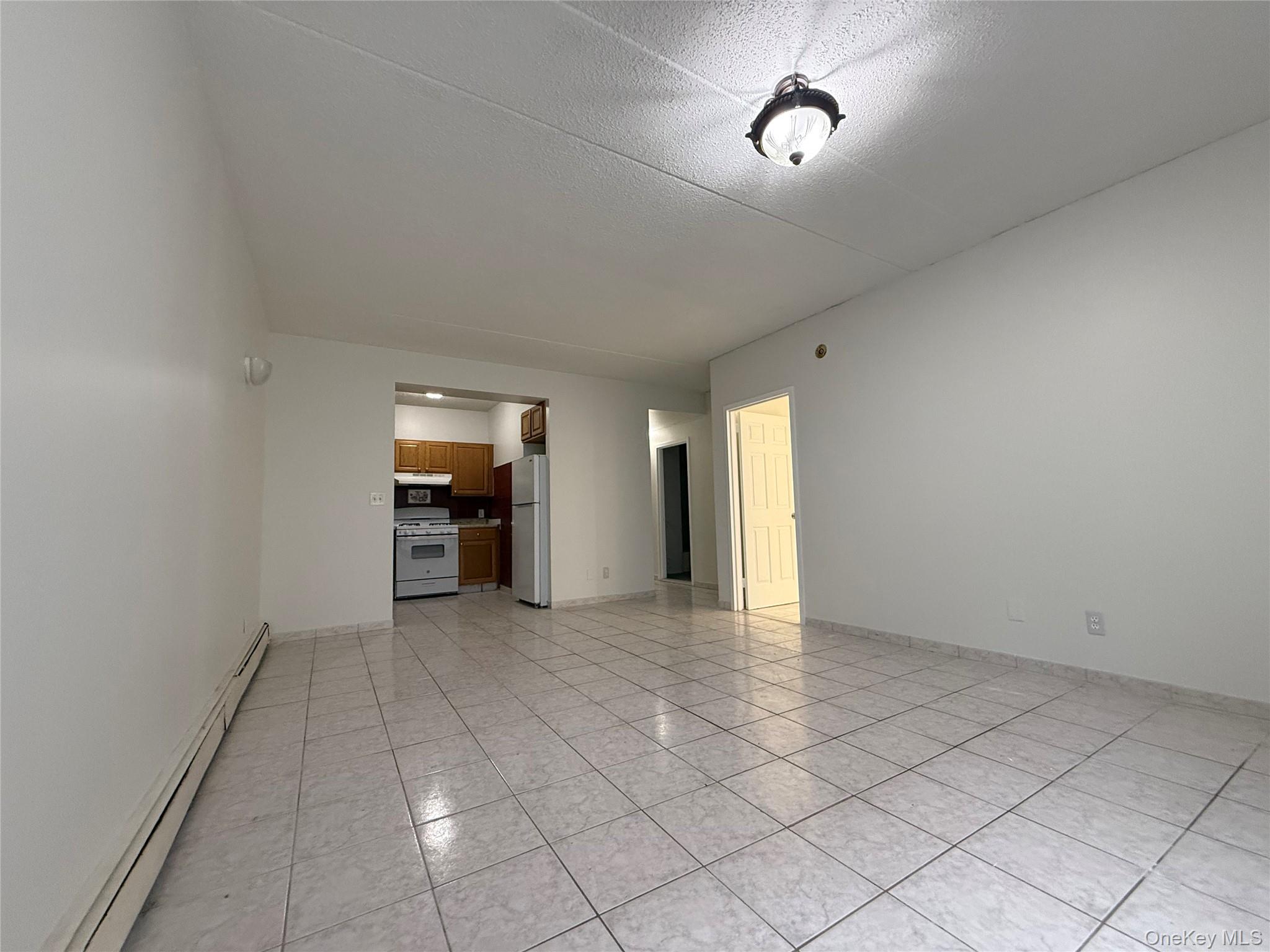 769 St Ann's Avenue, Unit B Bronx, NY 10456 - Photo 10 of 48 a view of a room with an empty space