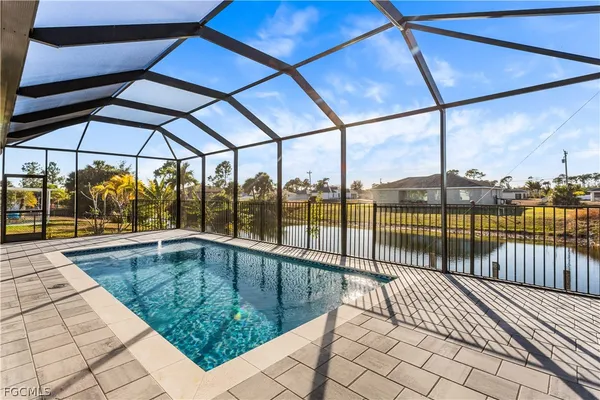 a swimming pool with lake view