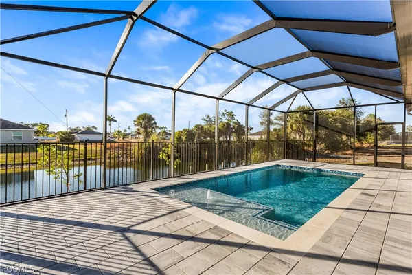 a front view of a house with swimming pool