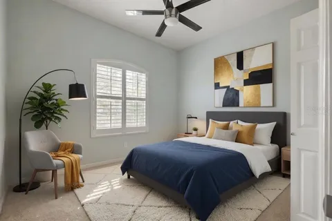 a bedroom with a bed and window