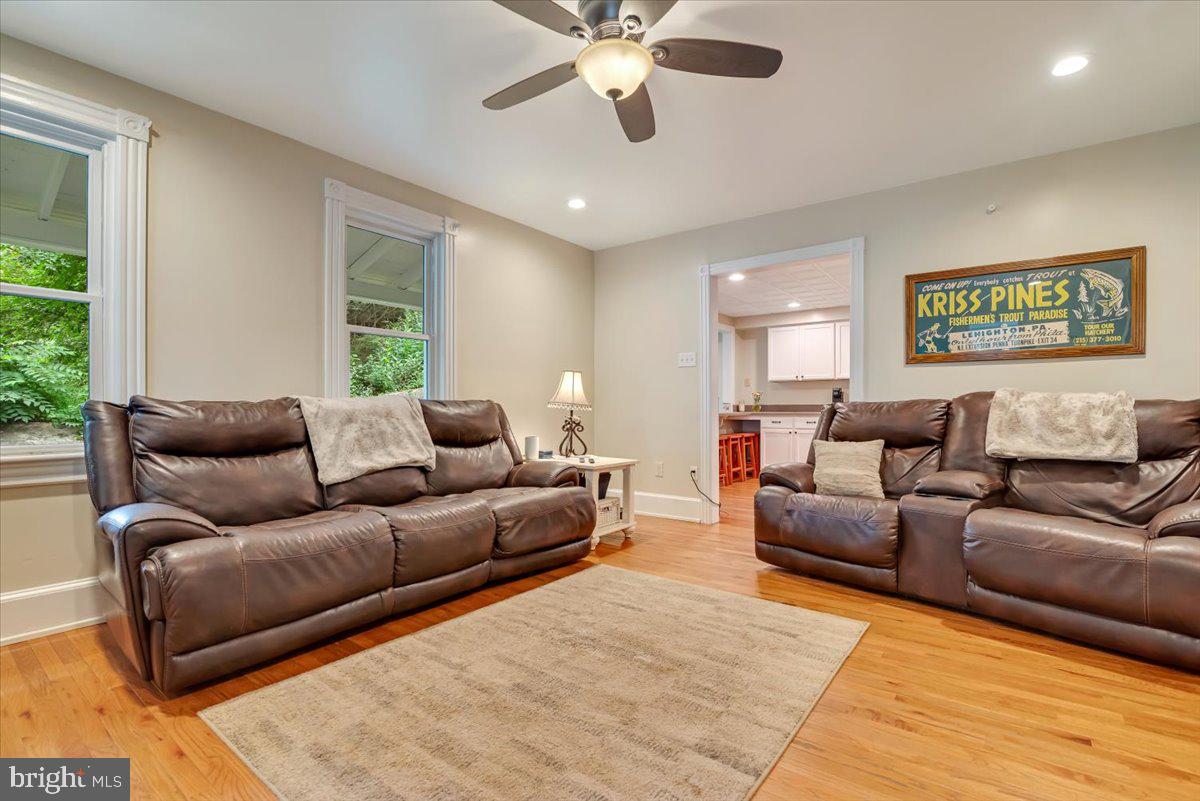 3585 Fairyland Road Lehighton, PA 18235 - Photo 12 of 109 a living room with furniture and a large window