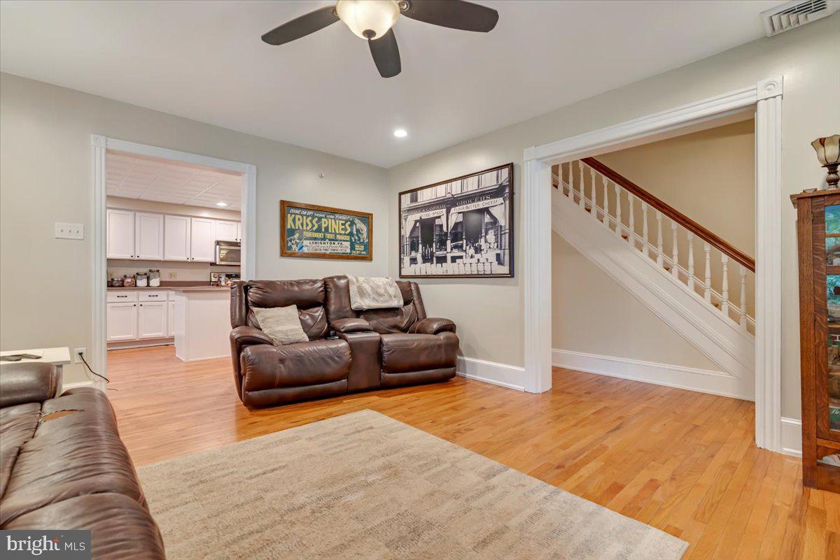 3585 Fairyland Road Lehighton, PA 18235 - Photo 13 of 109 a living room with furniture and a ceiling fan
