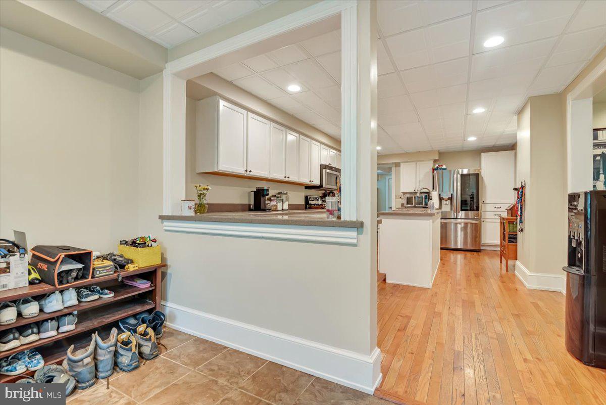 3585 Fairyland Road Lehighton, PA 18235 - Photo 22 of 109 a kitchen with stainless steel appliances granite countertop a refrigerator sink and cabinets