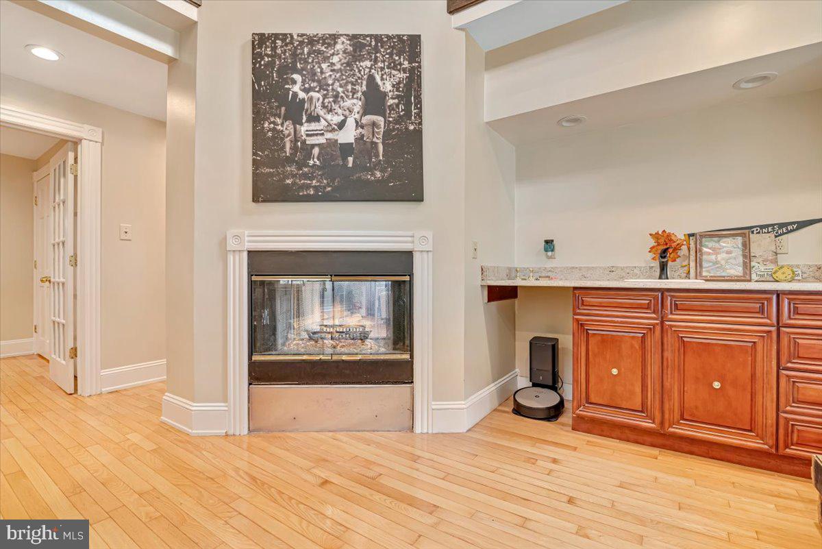 3585 Fairyland Road Lehighton, PA 18235 - Photo 30 of 109 a view of a livingroom with wooden floor and a fireplace