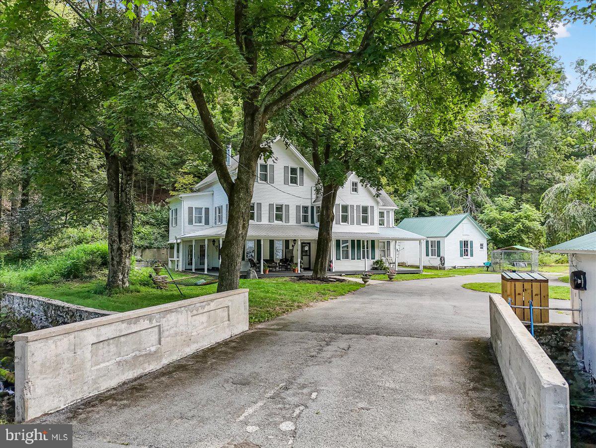 3585 Fairyland Road Lehighton, PA 18235 - Photo 4 of 109 a front view of a house with a yard and trees