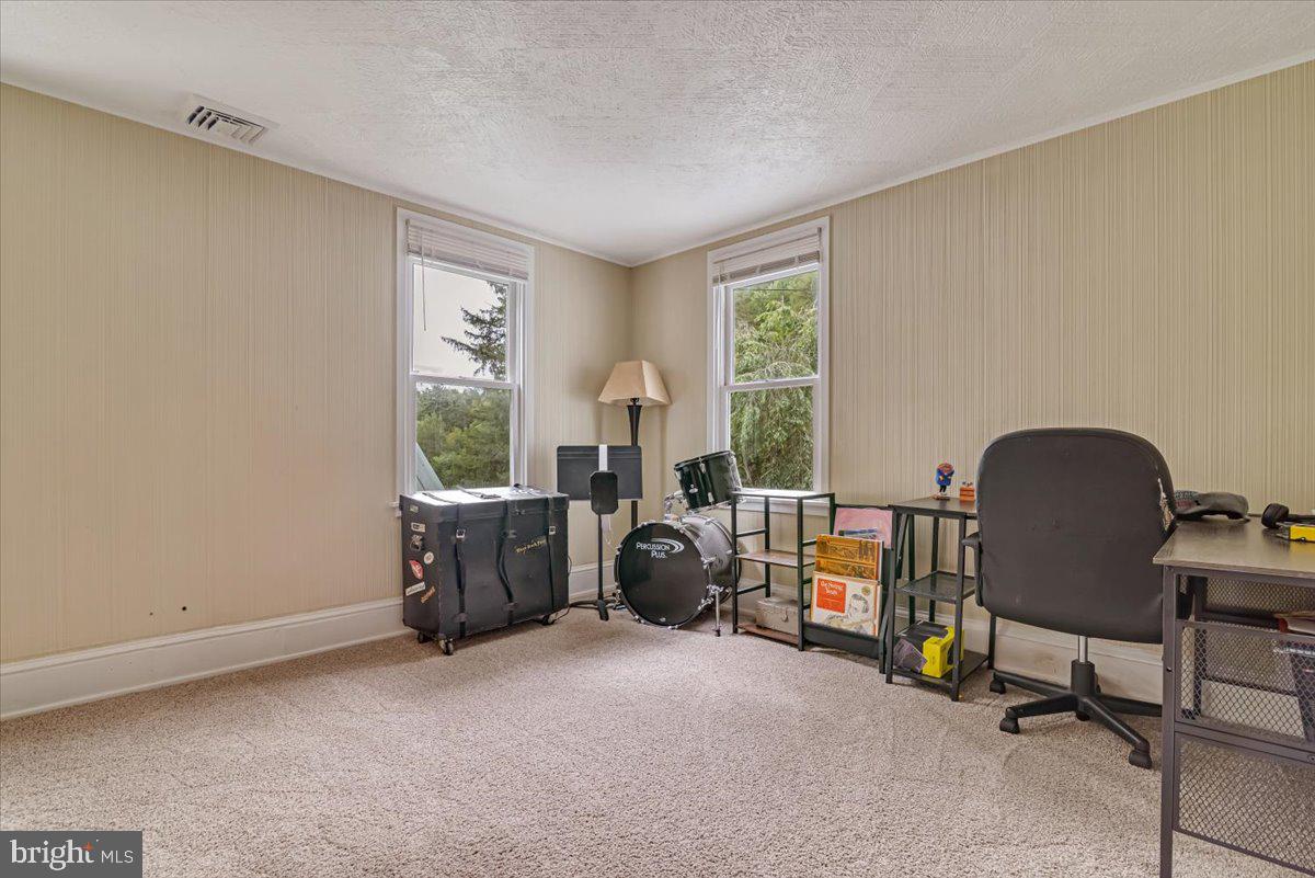 3585 Fairyland Road Lehighton, PA 18235 - Photo 45 of 109 a living room with furniture and a window