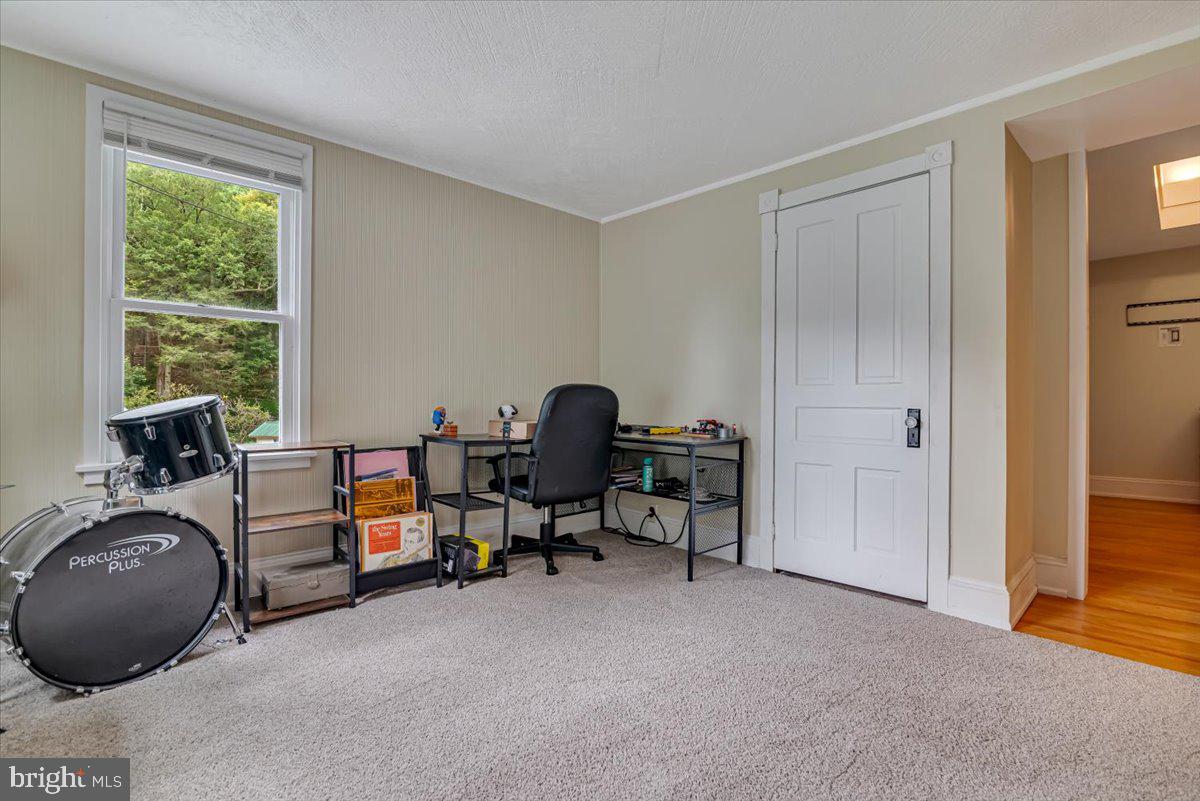 3585 Fairyland Road Lehighton, PA 18235 - Photo 47 of 109 a view of a workspace with a window and lounge chair