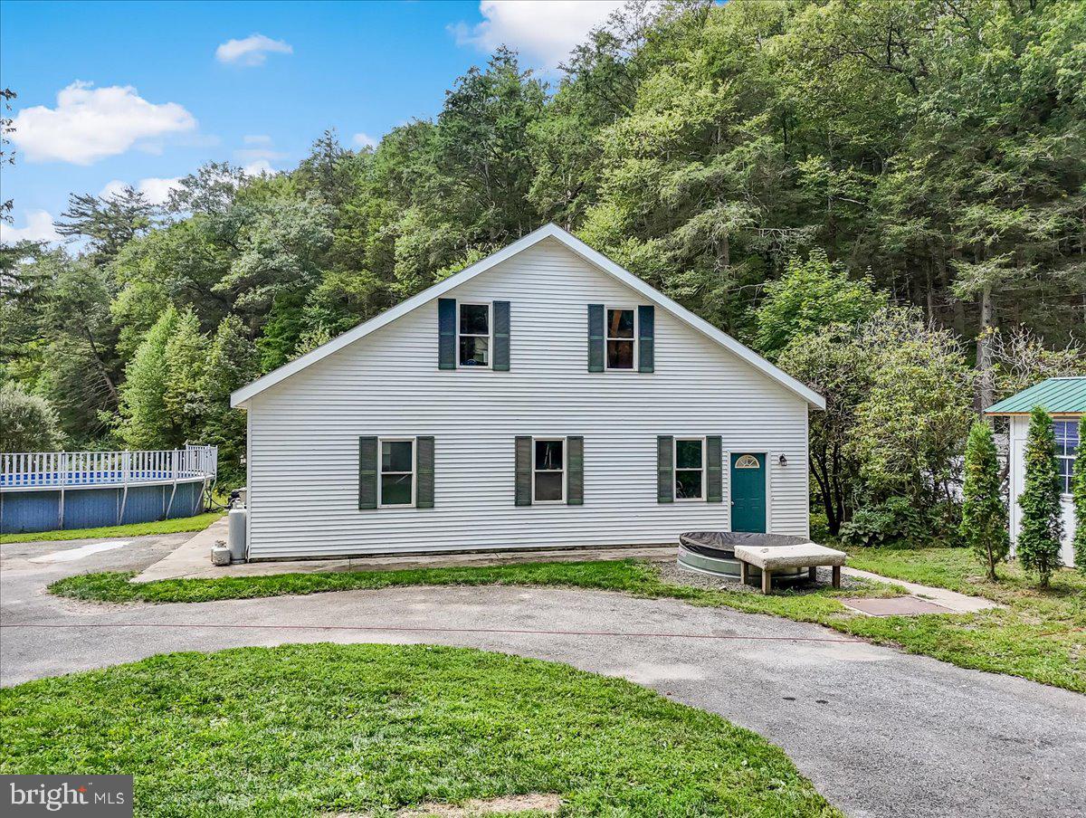 3585 Fairyland Road Lehighton, PA 18235 - Photo 75 of 109 a view of a yard in front of a house with large trees