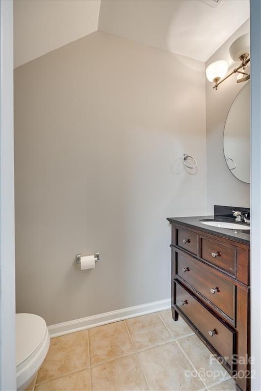 931 Copperstone Lane Fort Mill, SC 29708 - Photo 11 of 30 a bathroom with a sink a toilet and a mirror