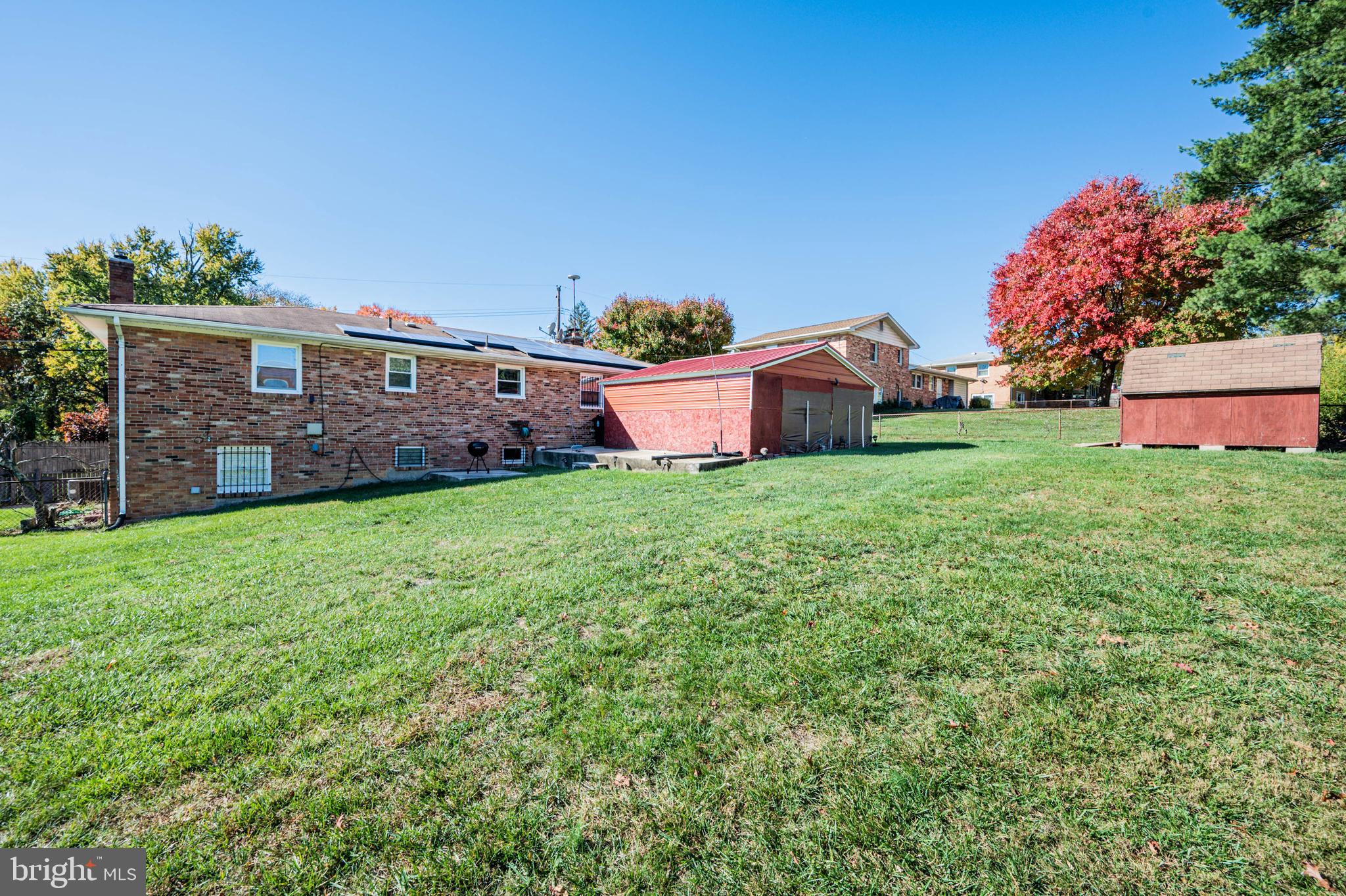 6500 Summerhill Road Temple Hills, MD 20748 - Photo 31 of 35 Back of House w/ Garage & Small Shed view