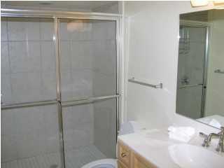 6050 Hwy Santa Rosa Beach, Unit 30A Santa Rosa Beach, FL 32459 - Photo 13 of 23 a bathroom with a sink and shower