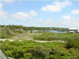 6050 Hwy Santa Rosa Beach, Unit 30A Santa Rosa Beach, FL 32459 - Photo 22 of 23 a view of a lake with houses in the back