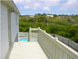 6050 Hwy Santa Rosa Beach, Unit 30A Santa Rosa Beach, FL 32459 - Photo 3 of 23 a view of a balcony with an outdoor space