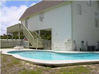 6050 Hwy Santa Rosa Beach, Unit 30A Santa Rosa Beach, FL 32459 - Photo 5 of 23 a view of a house with a yard