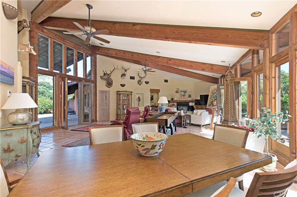 26611 Carancho Road Temecula, CA 92590 - Photo 1 of 1 a view of a dining room with furniture window and outside view