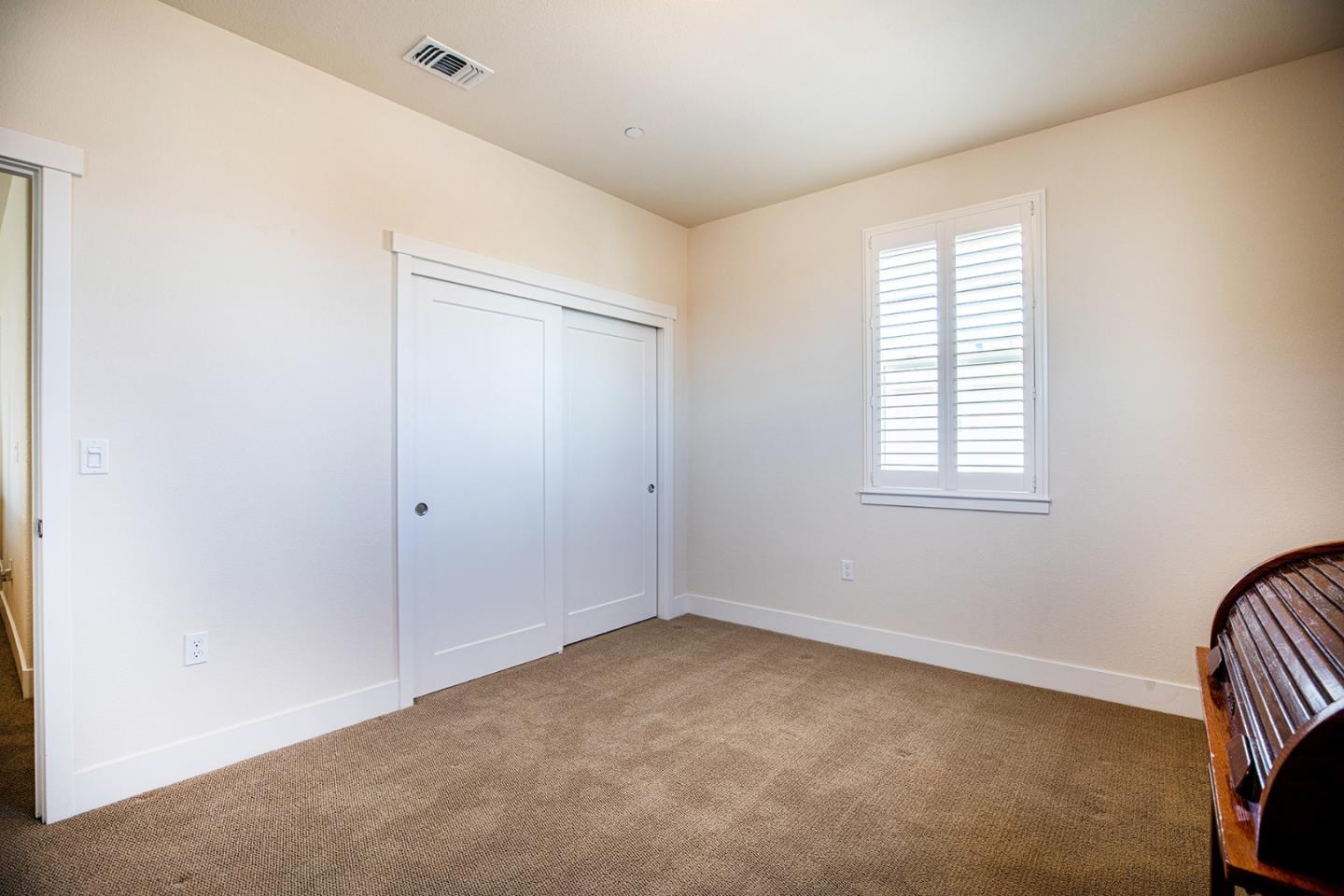 14741 Kit Carson Drive East Garrison, CA 93933 - Photo 20 of 24 a view of an empty room with a window