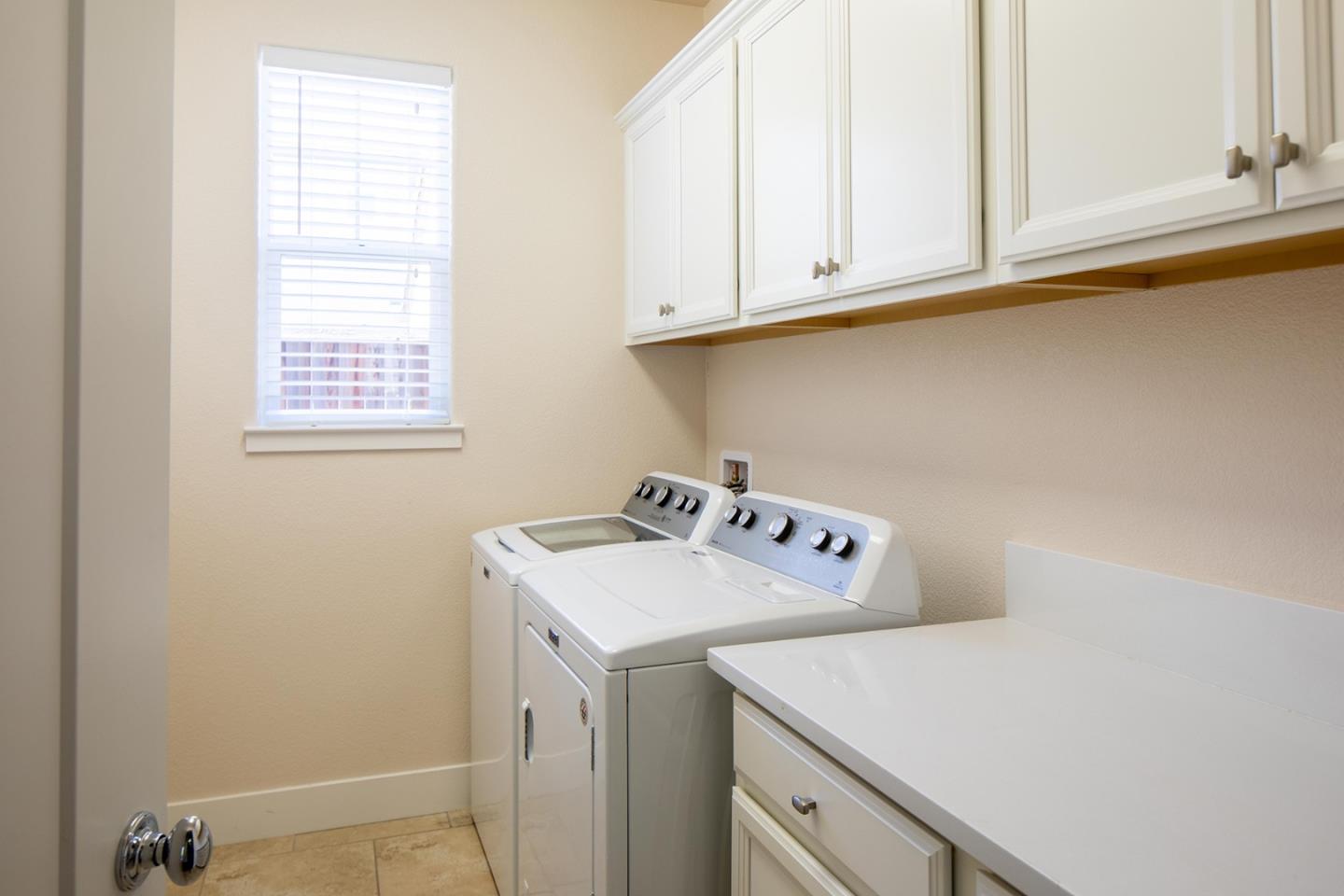 14741 Kit Carson Drive East Garrison, CA 93933 - Photo 21 of 24 a utility room with dryer and washer