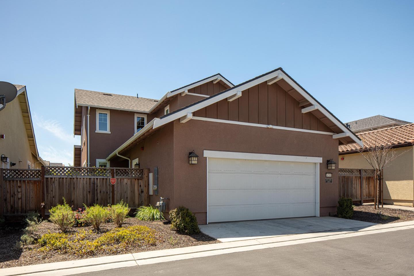 14741 Kit Carson Drive East Garrison, CA 93933 - Photo 24 of 24 a view of a house with wooden fence