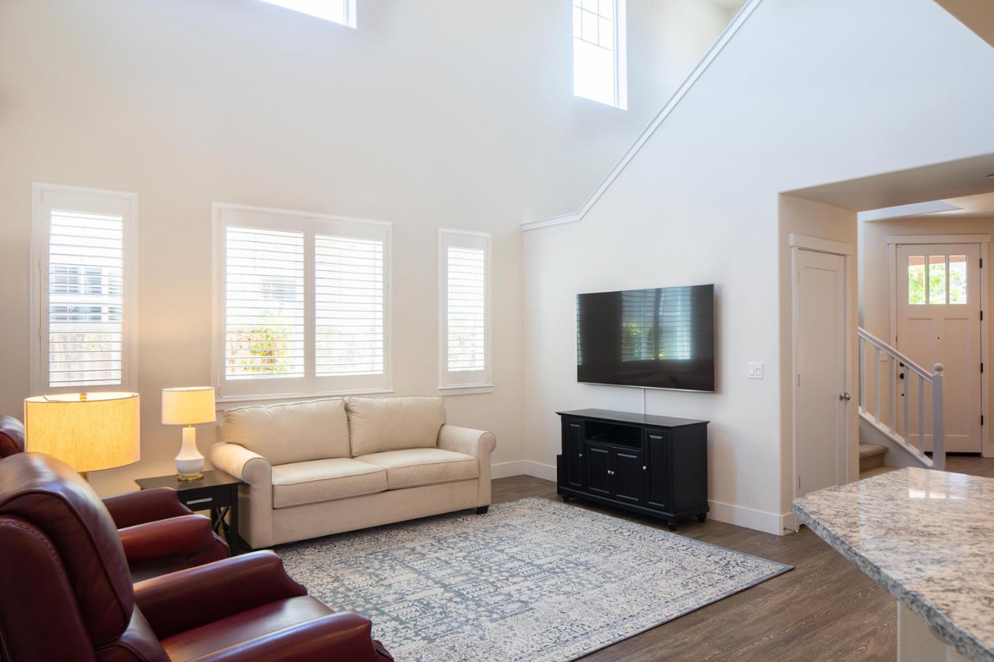 14741 Kit Carson Drive East Garrison, CA 93933 - Photo 4 of 24 a living room with furniture and a flat screen tv