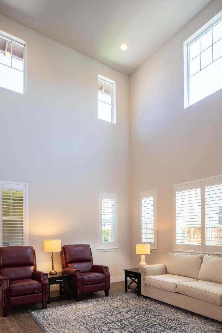 14741 Kit Carson Drive East Garrison, CA 93933 - Photo 5 of 24 a living room with furniture and a couch