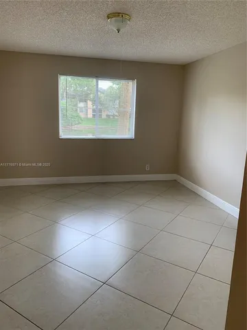 $295,000 | 9977 Westview Drive, Unit 116, Coral Springs, FL 33076