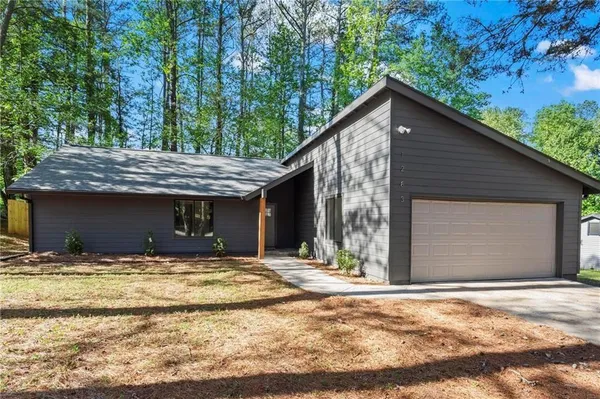 a house view with a outdoor space
